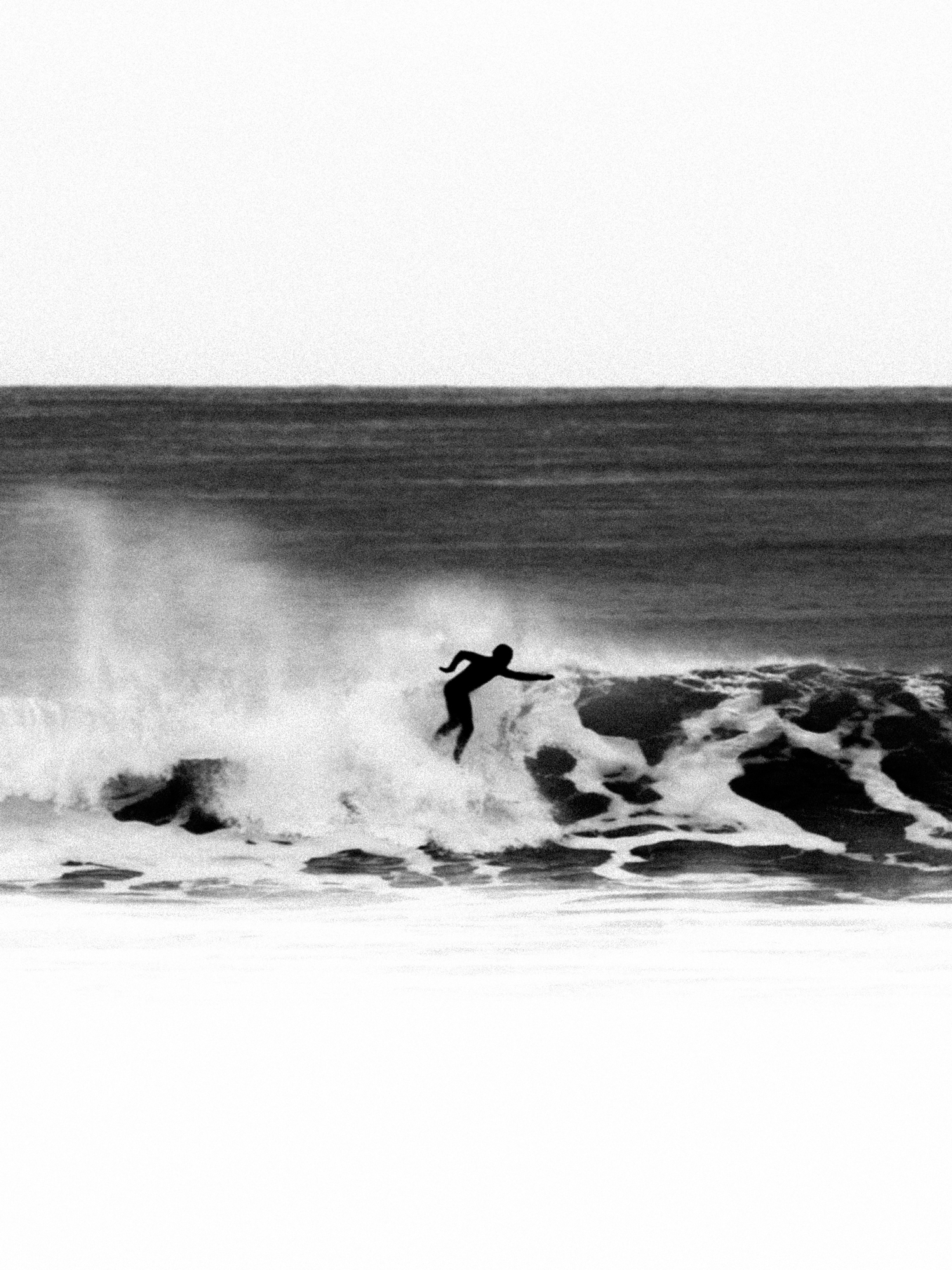 En kald venstre, ukjent surfer
